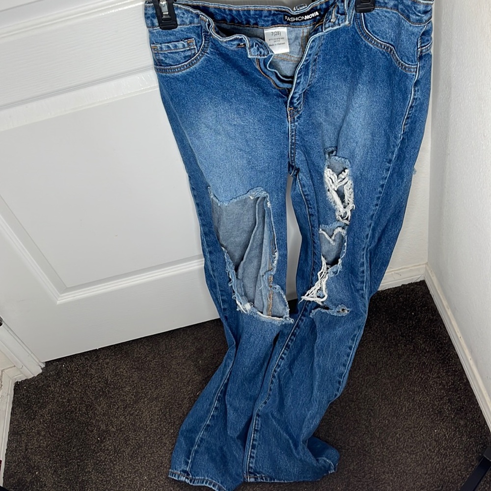 dark washed ripped jeans